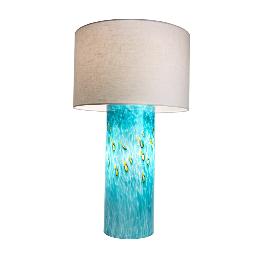 Wimberley Glassworks 3-way Lighted Glass Base Cylinder Table Lamp with Fabric Shade and Emerald Ocean teal blue and ochre yellow accent glass